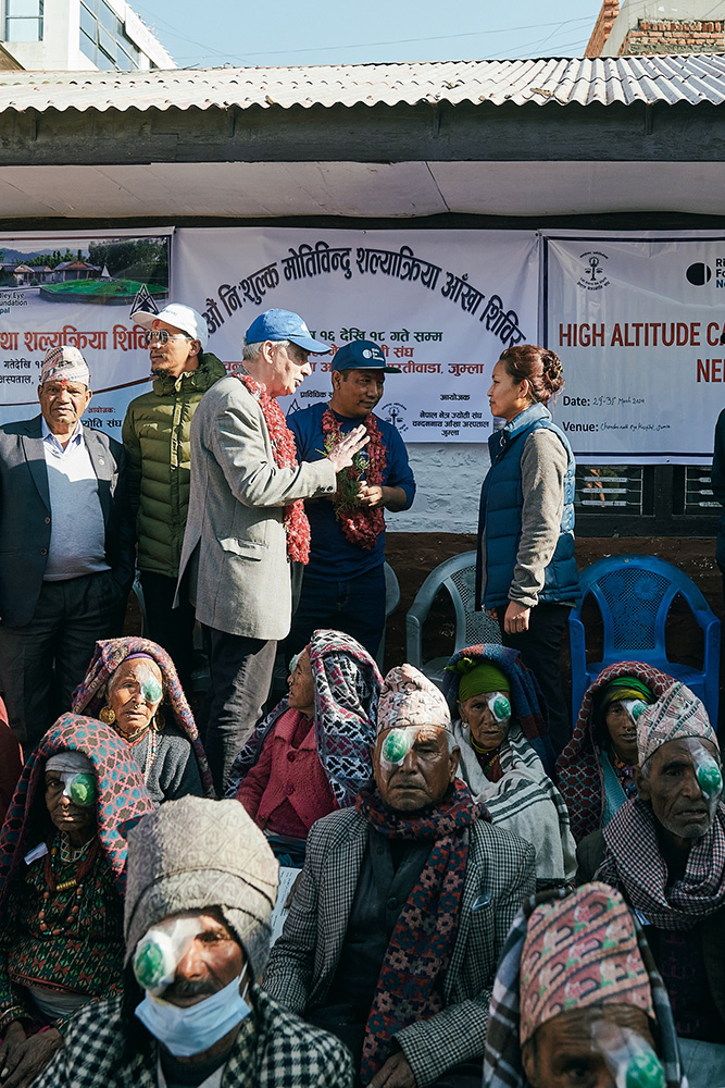Alistair Wood in Nepal Talking with Surgeon
